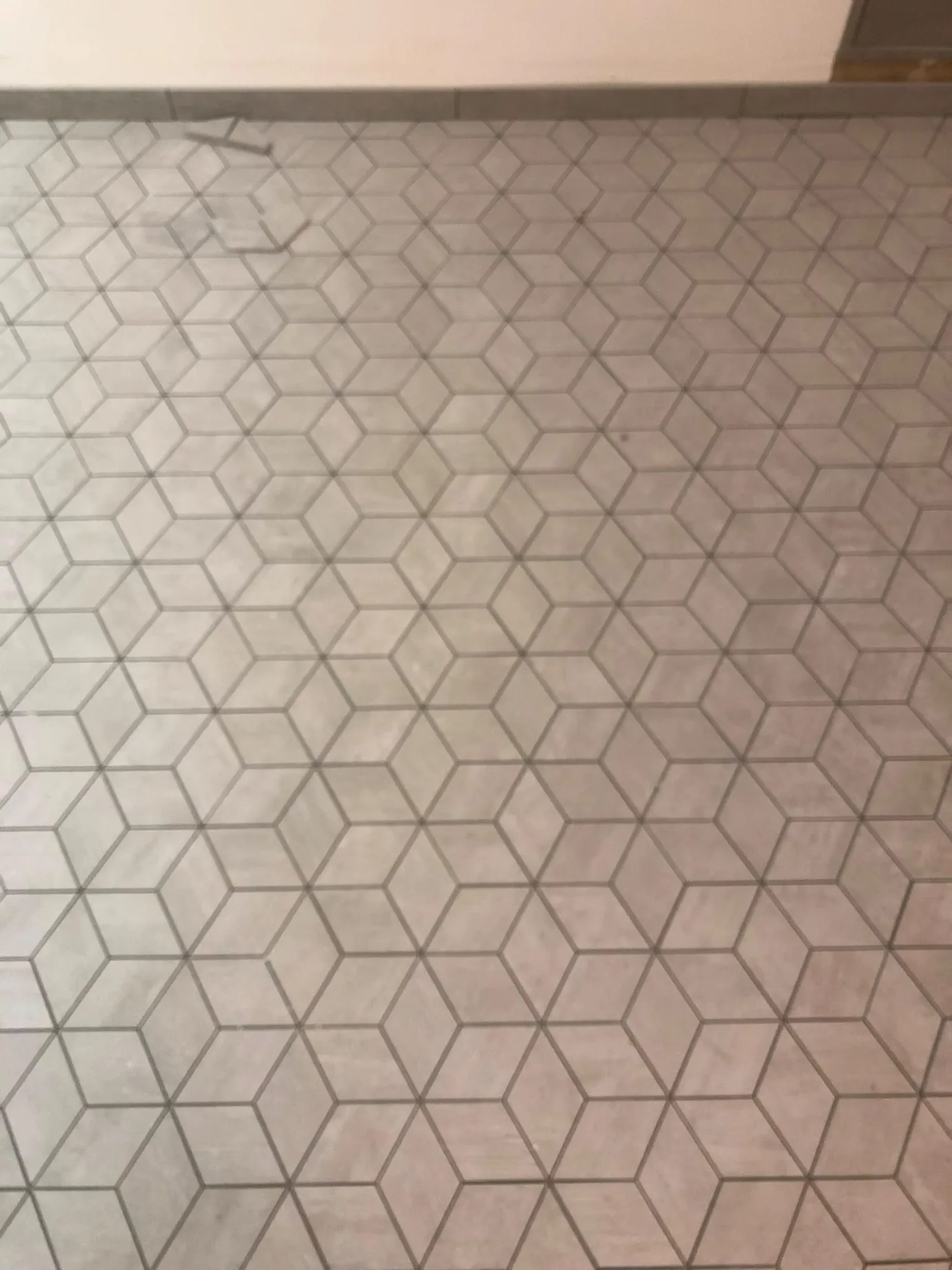 Geometric 3D cube mosaic porcelain floor tile installation in Berlin CT by Dmtilellc
